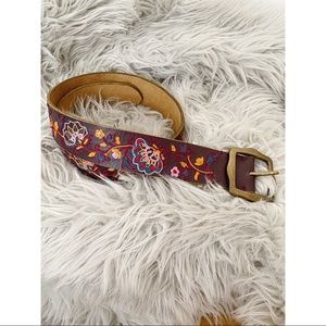 Lucky Brand Flower Power belt with embroidered flowers and brass buckle.